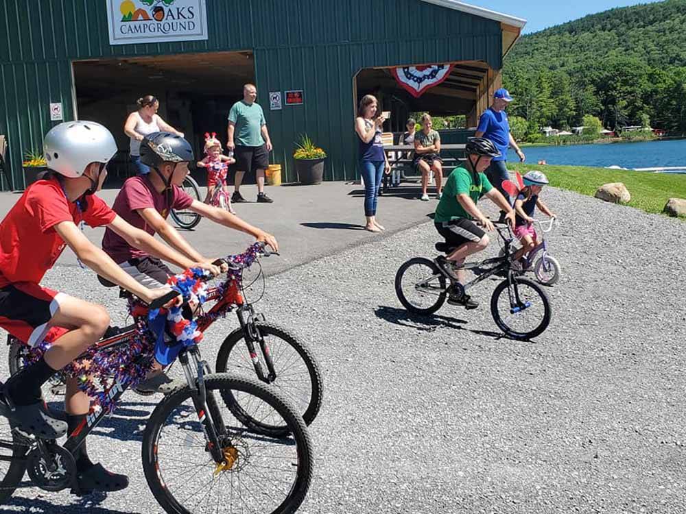 Kids riding their bikes at TWIN OAKS CAMPGROUND
