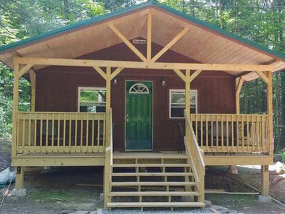 Exterior of a cabin with a porch