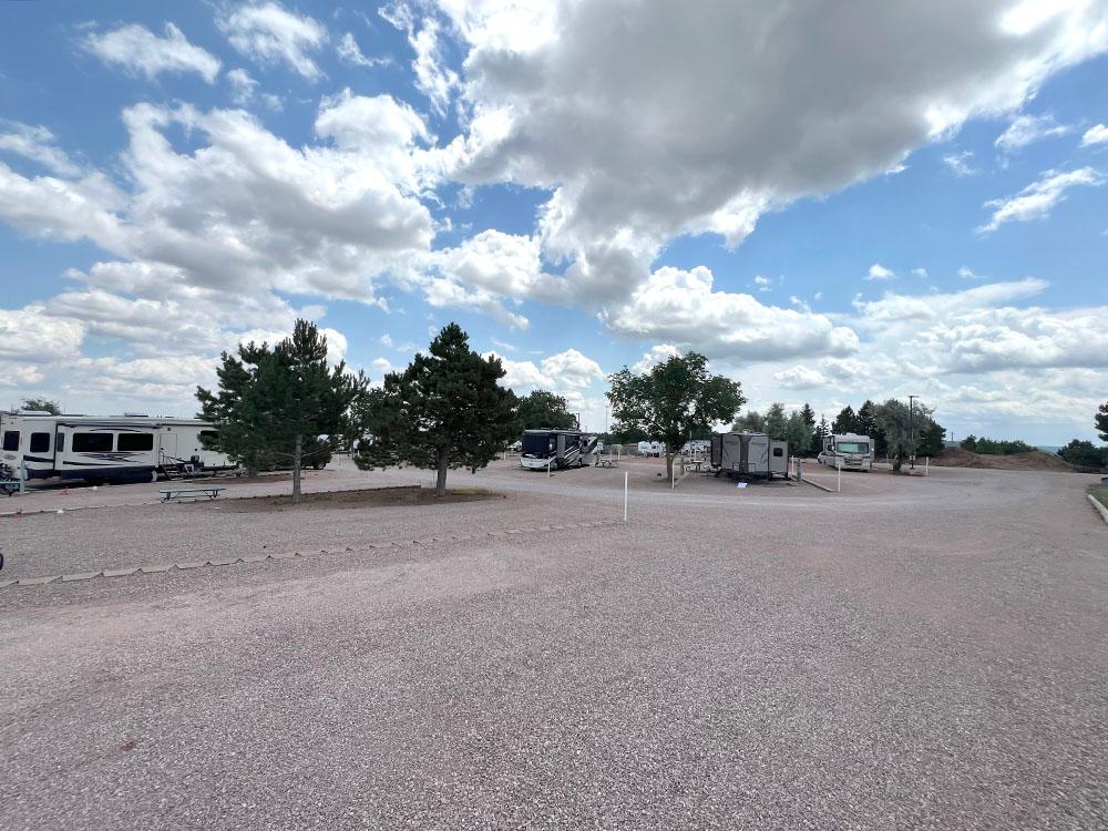 Fluffy clouds and blue sky over the park at BLACK HILLS RV PARK