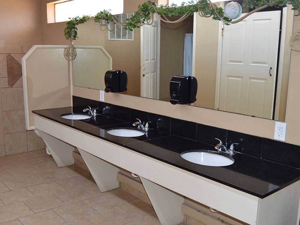 The three bathroom sinks at ABILENE RV PARK