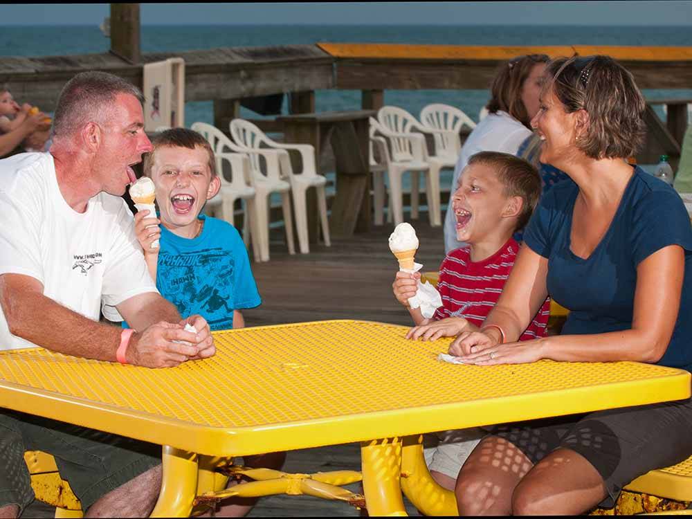 A family eating ice cream at APACHE FAMILY CAMPGROUND & PIER