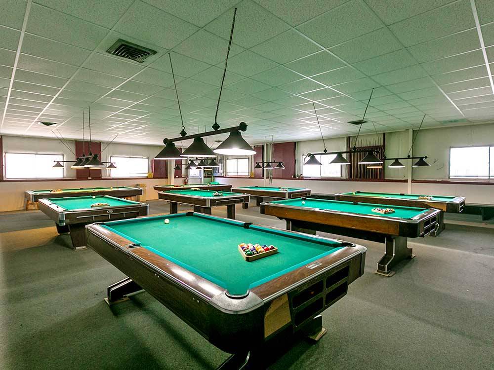 Pool tables in game room at ENCORE SUNSHINE