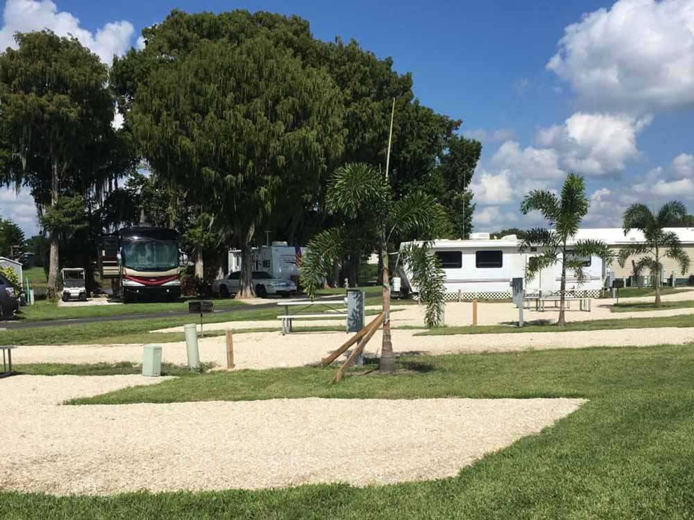 A line of gravel RV sites at ZACHARY TAYLOR WATERFRONT RV RESORT