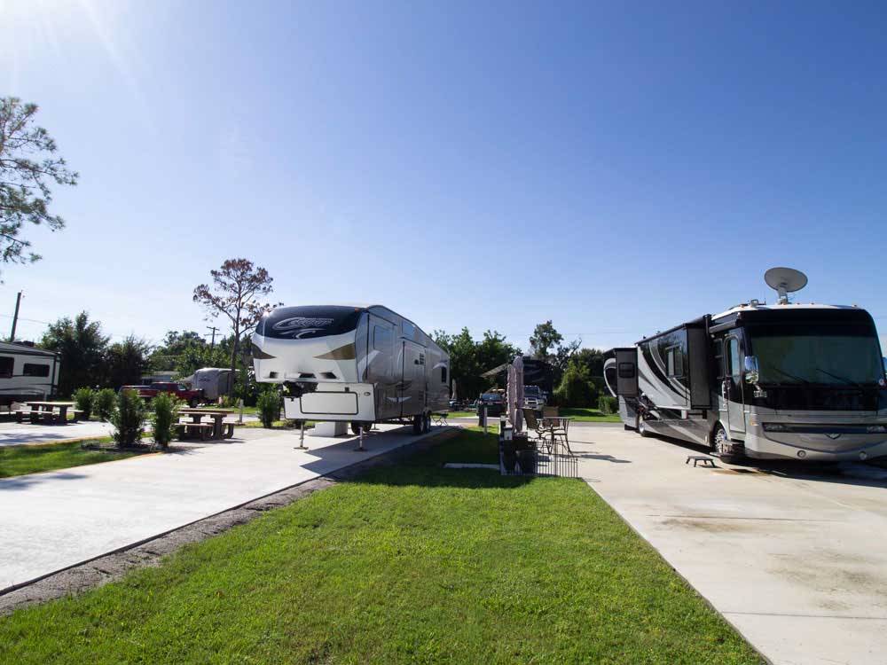 Paved sites with fifth-wheel and motorhome at RIVER VISTA RV VILLAGE