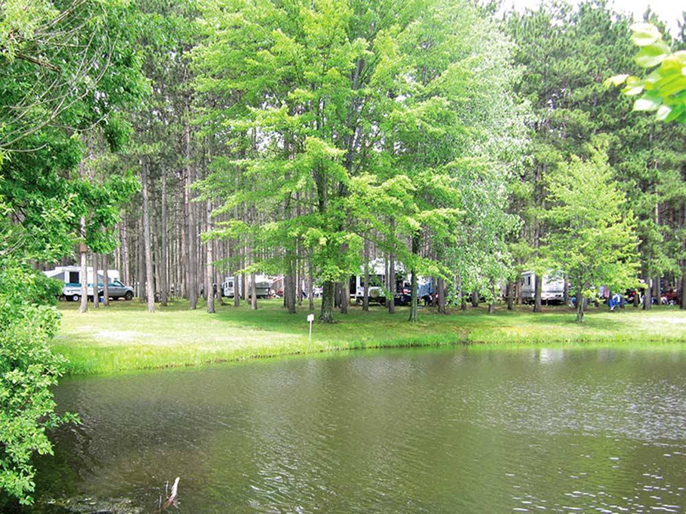 Trailers camping on lake at YUKON TRAILS CAMPING RESORT
