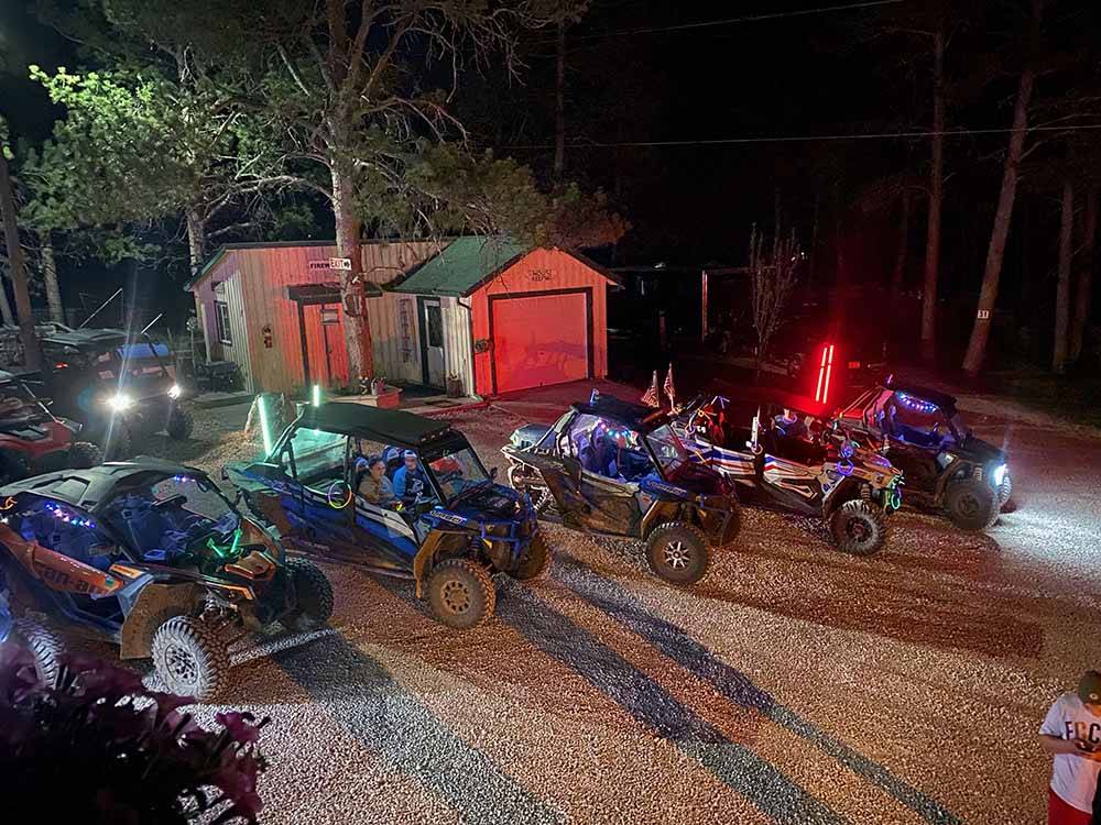 ATVs ready to go out at night at BEAVER LAKE CAMPGROUND