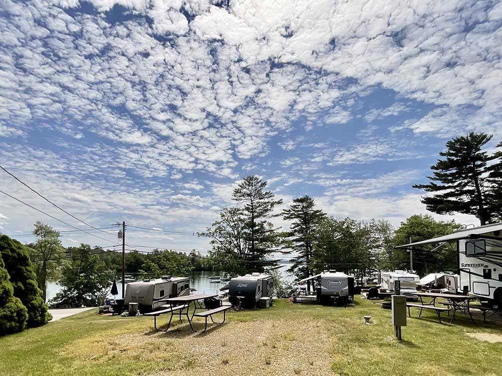 Open area with multiple RVs at LONG ISLAND BRIDGE CAMPGROUND