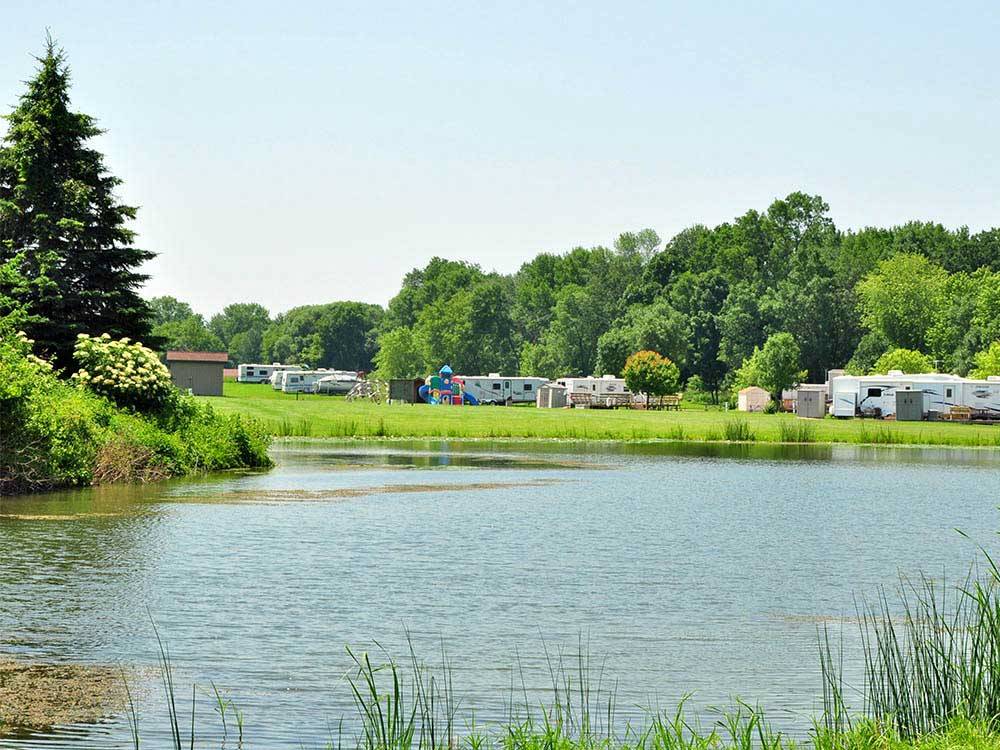 Trailers camping on lake at FREMONT RV CAMPGROUND