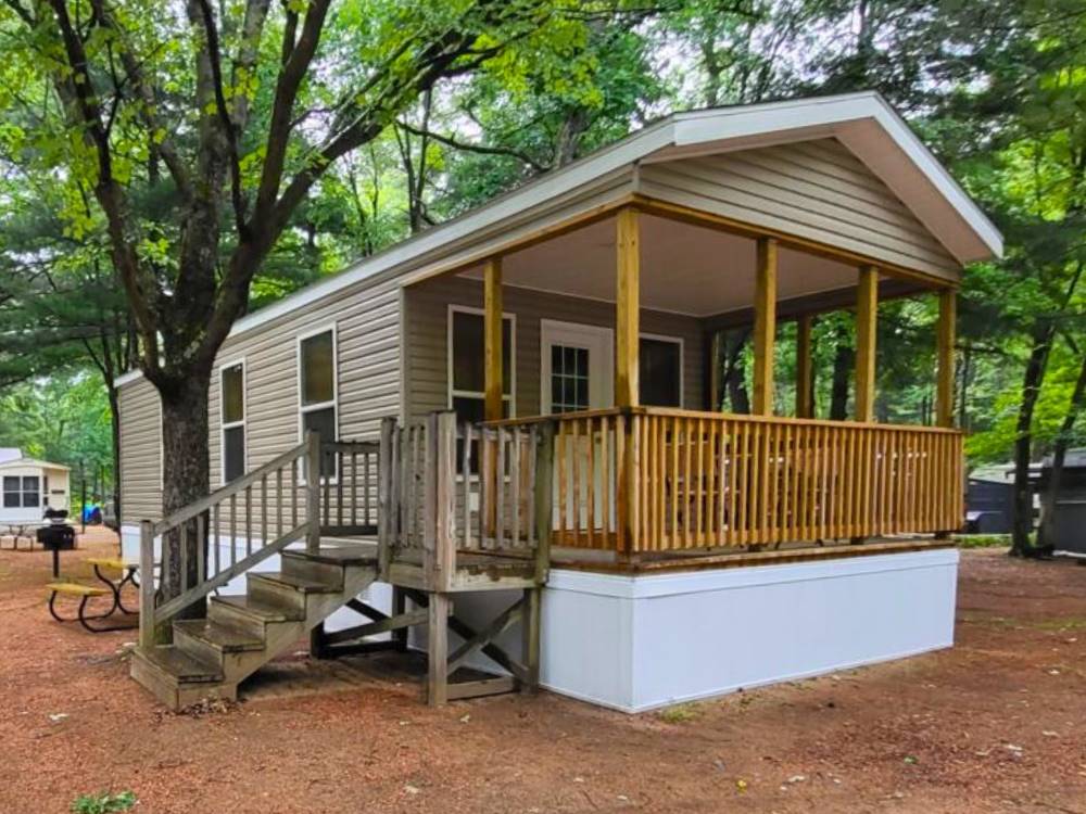 A small cabin with a porch