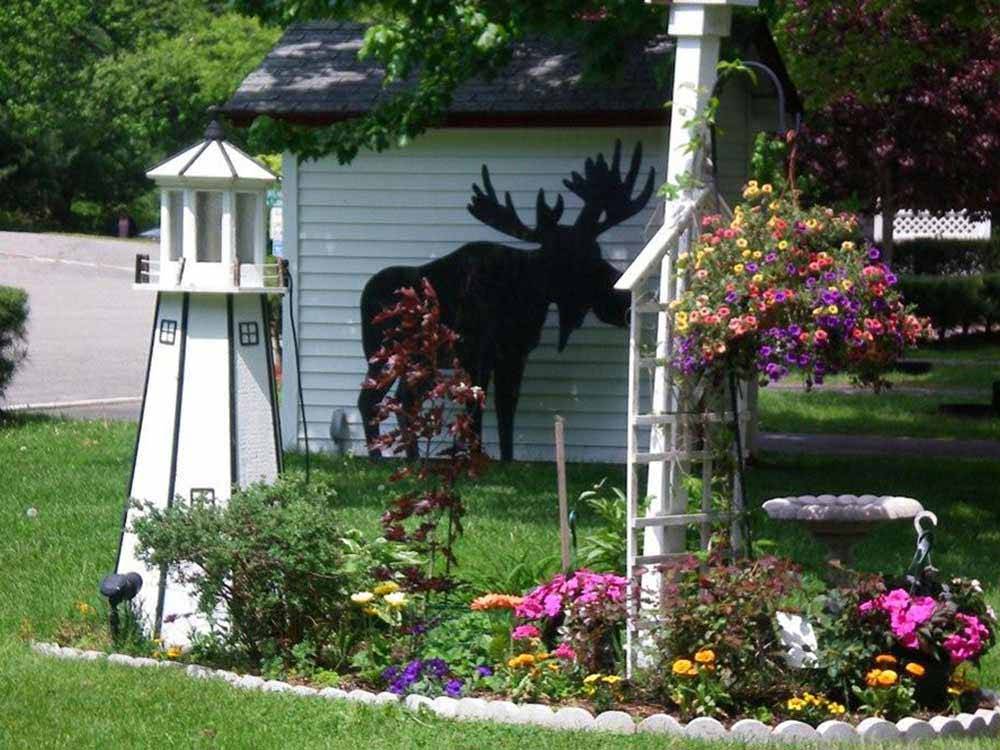 A cut out of a moose at RED APPLE CAMPGROUND