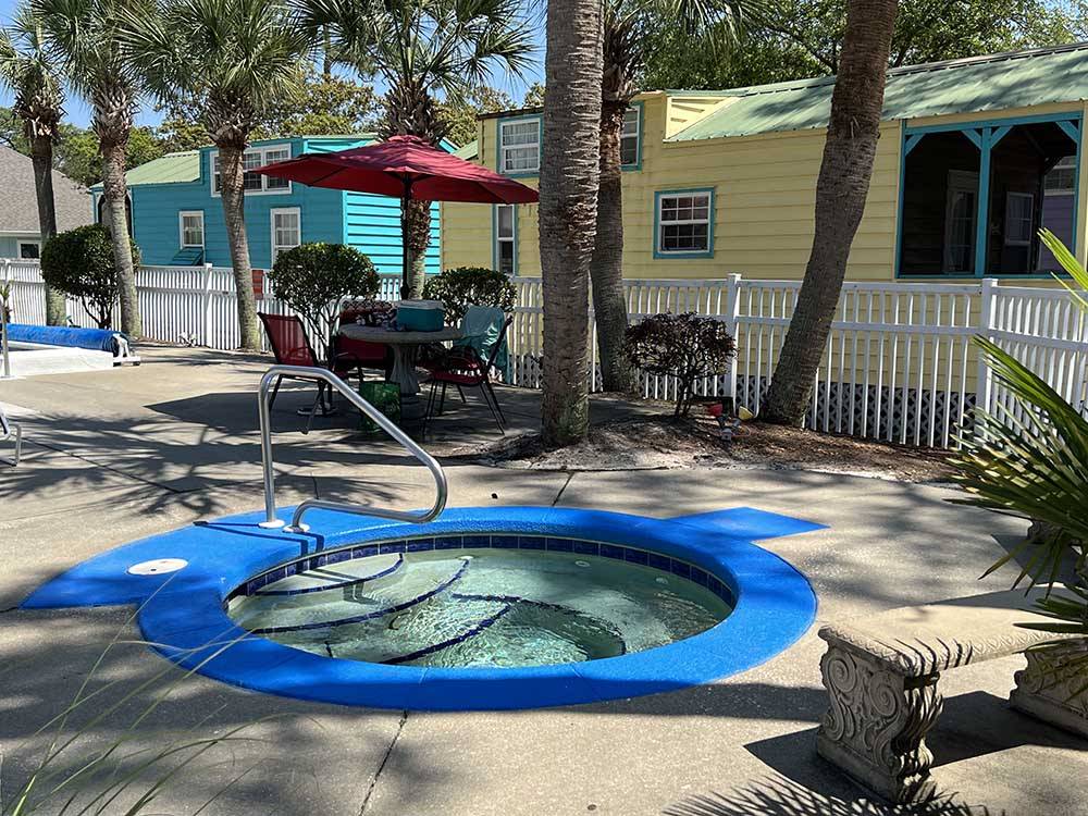 The hot tub in the swimming pool area at NAVARRE BEACH CAMPING RESORT