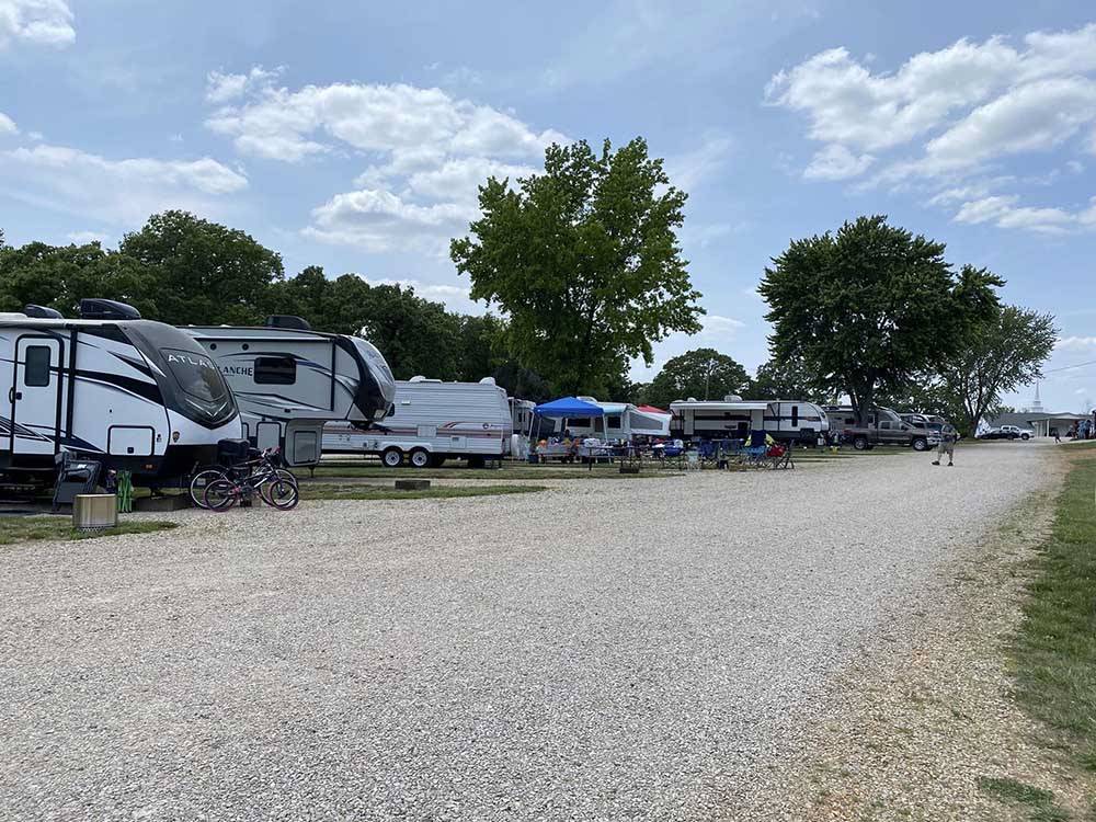 A row of trailers parked in gravel sites at MERAMEC CAMPGROUND