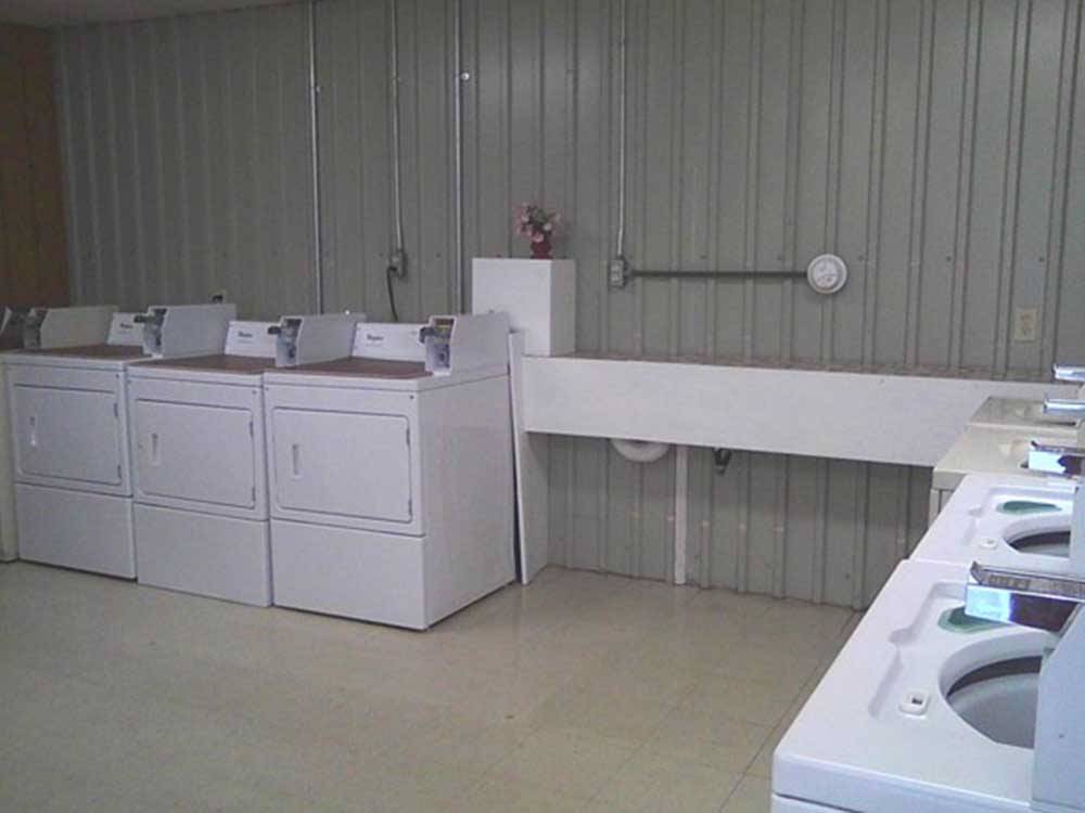 Washer and dryers in the laundry room at MERAMEC CAMPGROUND