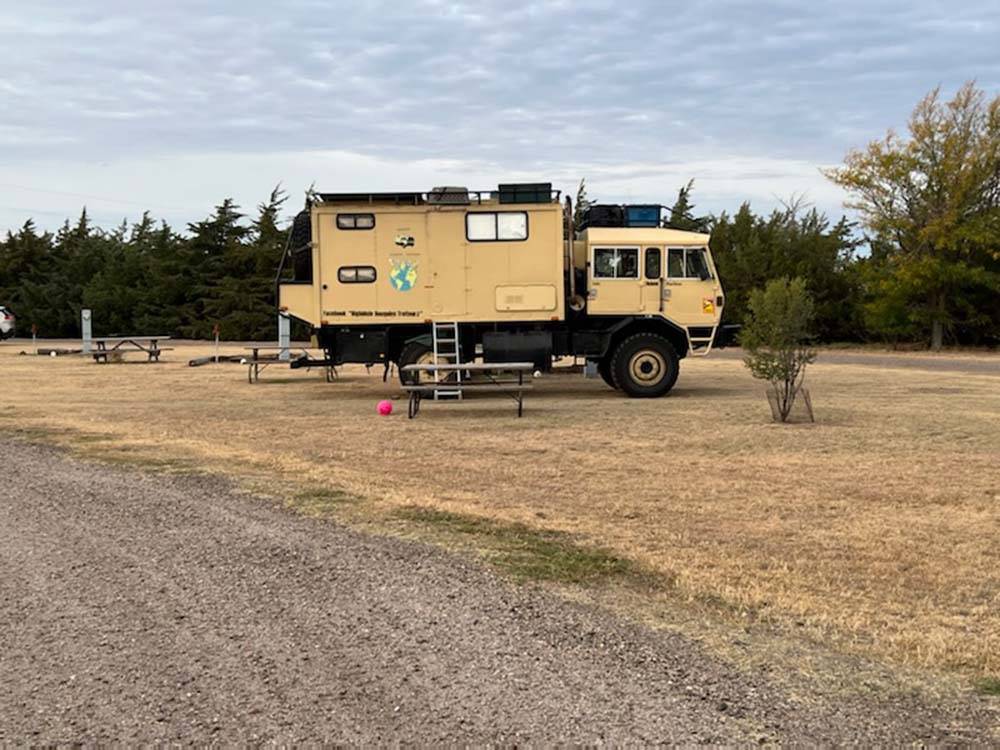 A search and rescue tank parked in a grassy site at HIGH PLAINS CAMPING