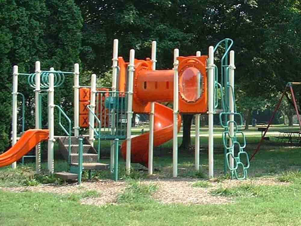 The orange and green playground at ENON BEACH CAMPGROUND