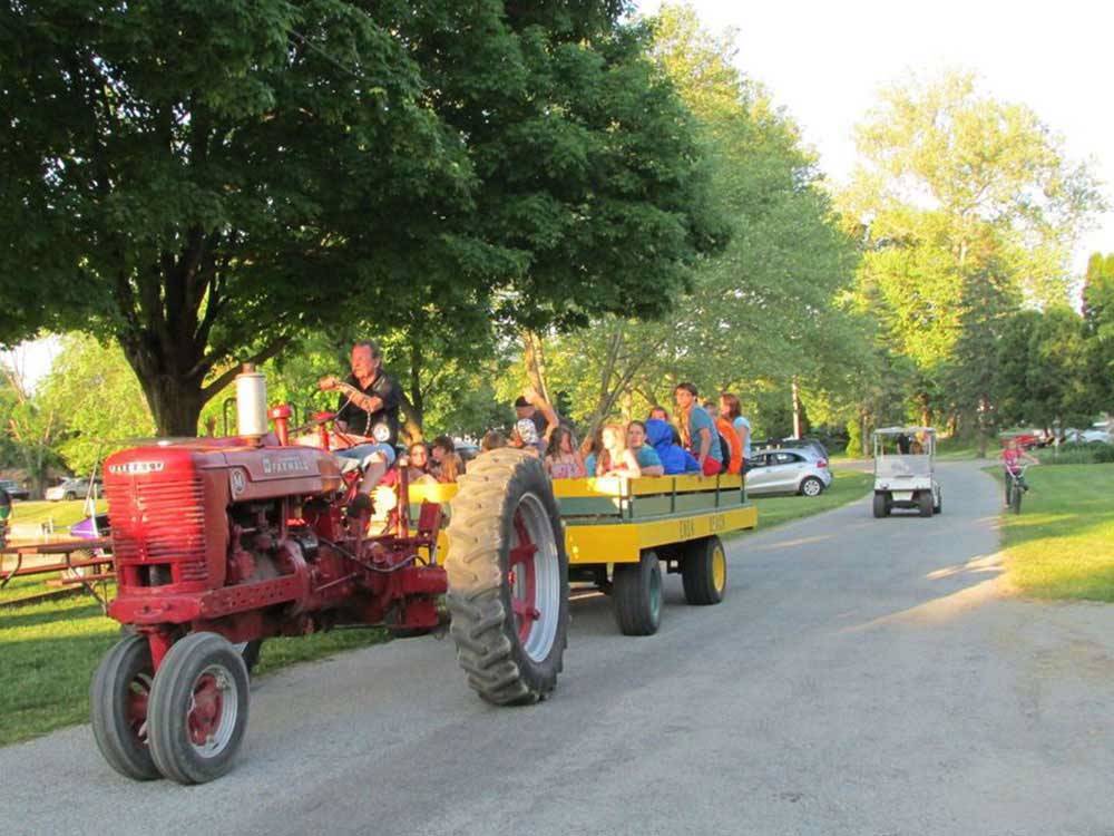Campers enjoying a hayride at ENON BEACH CAMPGROUND