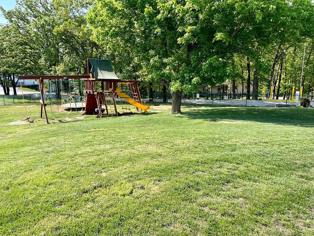 The grassy playground area at OSAGE BEACH RV PARK