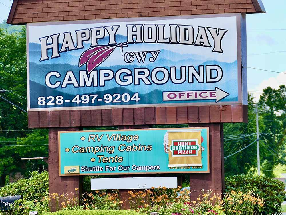 The front entrance sign at HAPPY HOLIDAY CAMPGROUND