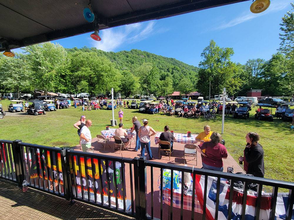 Guests socializing at Happy Holiday Campground