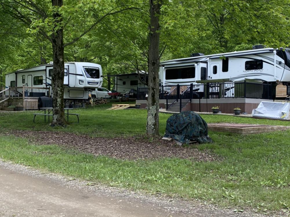 Two RVs with long-term decks