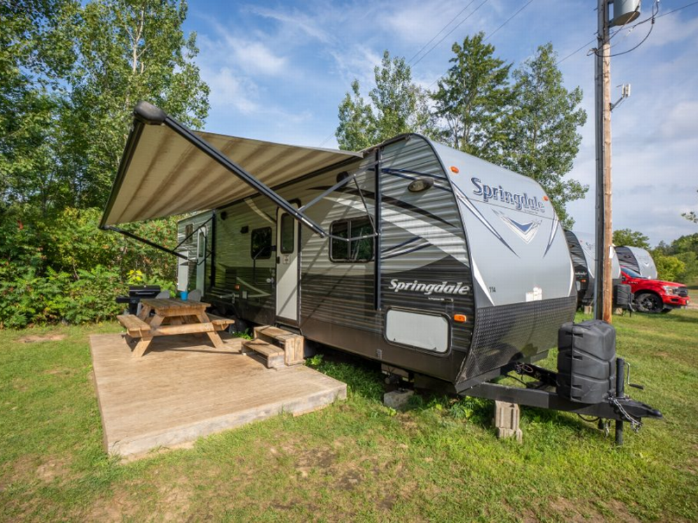 RV site with step down to a deck