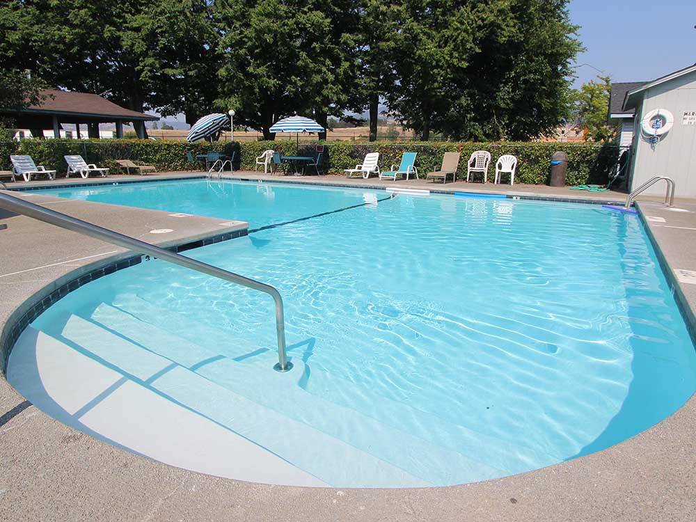 The swimming pool area at HOLIDAY RV PARK