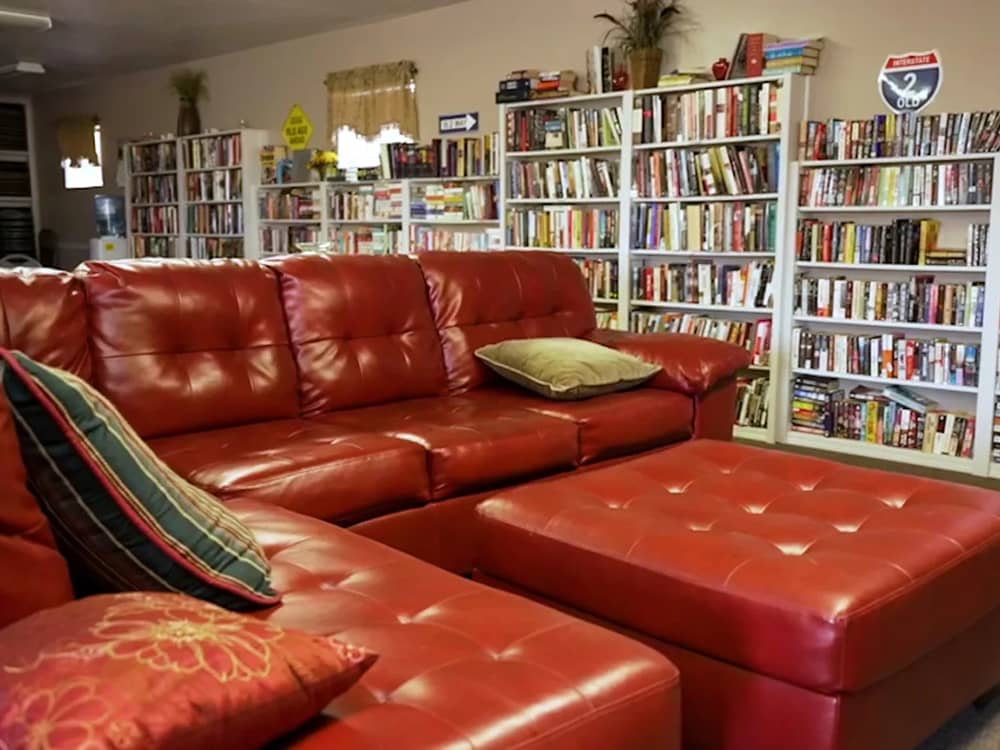Lounge Room with a lot of books