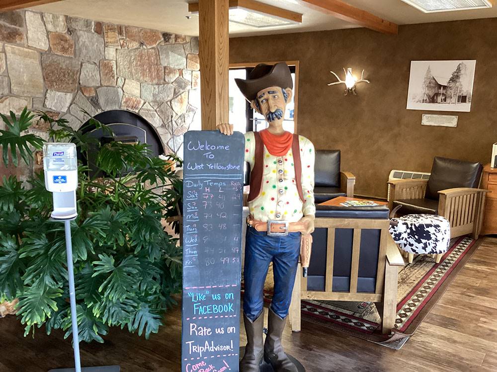 A cowboy statue displaying the temperatures at PONY EXPRESS RV PARK