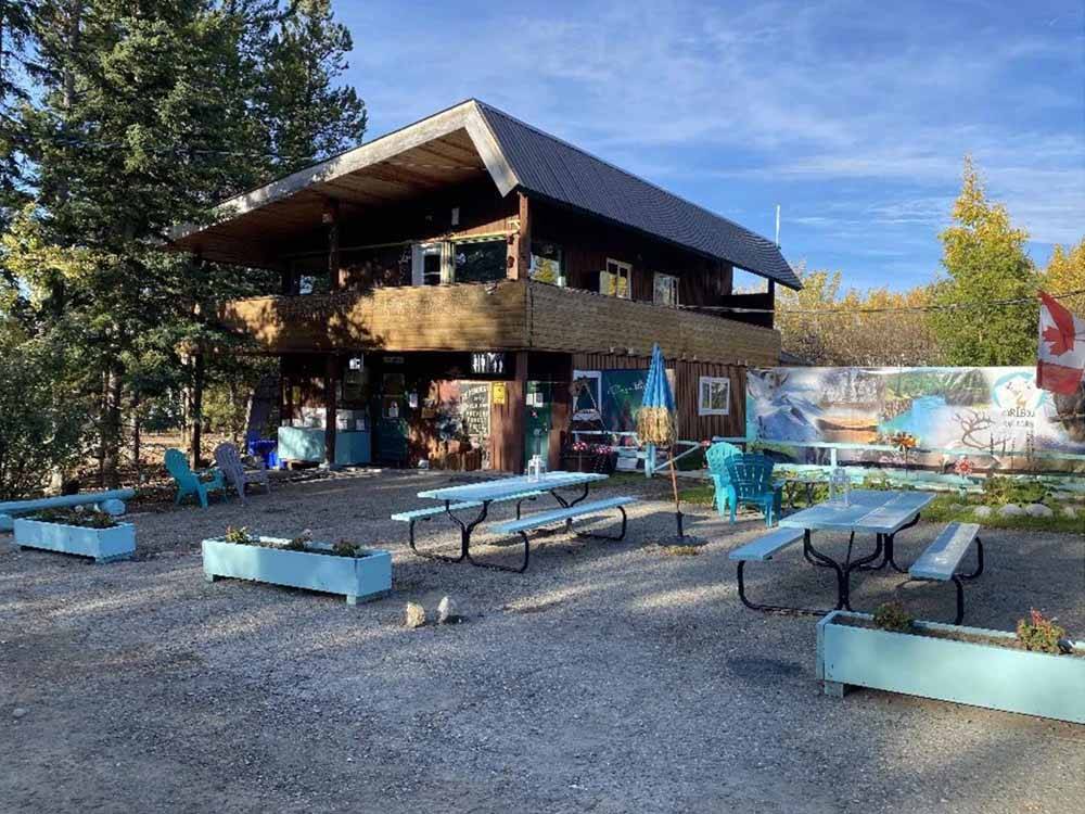 Two-story clubhouse overlooking picnic area at CARIBOU RV PARK