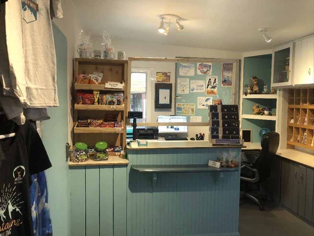 Front desk with souvenirs displayed at CARIBOU RV PARK