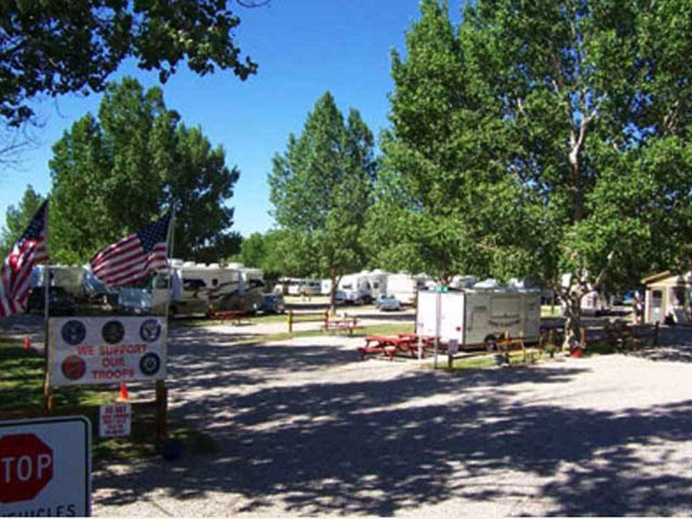 Entrance to the RV park with trees at AB CAMPING RV PARK