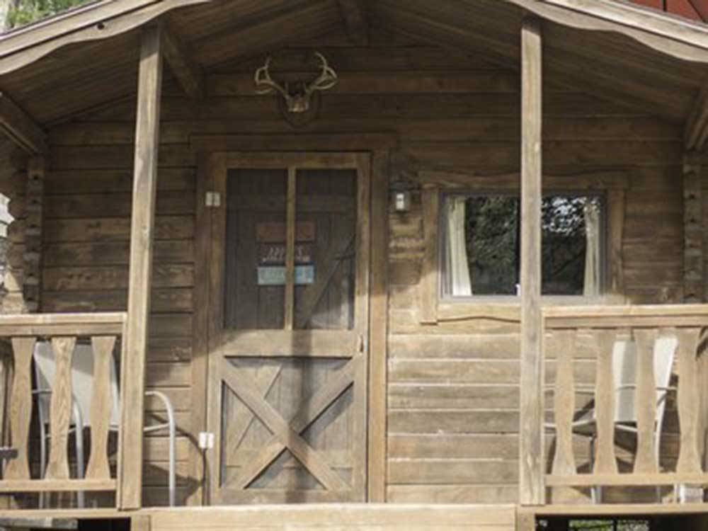 The front of one of the rental cabins at PARADISE LAKE AND CAMPGROUND