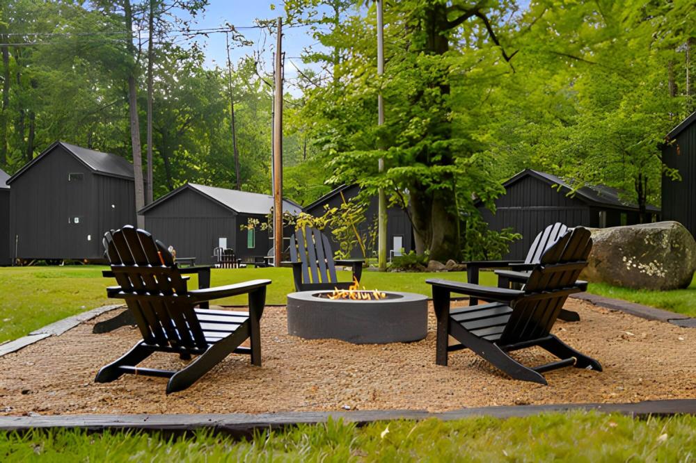 Fire pit with chairs around it at Roamstead