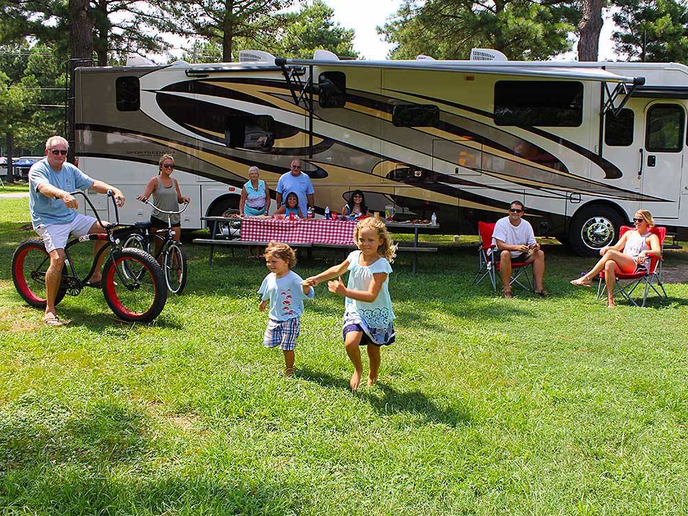Family camping in RV at BETHPAGE CAMP-RESORT