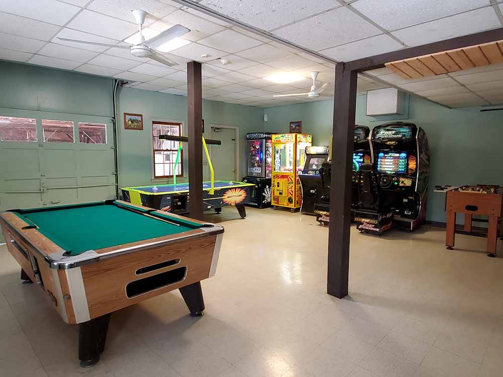 The arcade room with a pool table at SALEM FARMS CAMPGROUND
