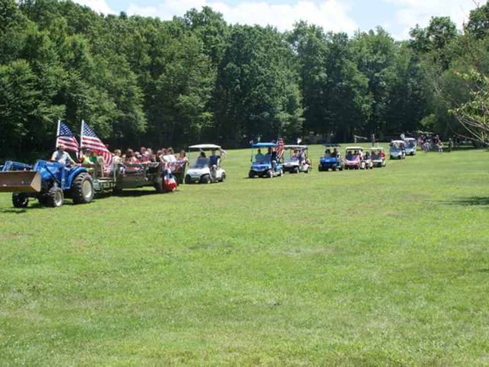 A line up of golf carts at SALEM FARMS CAMPGROUND