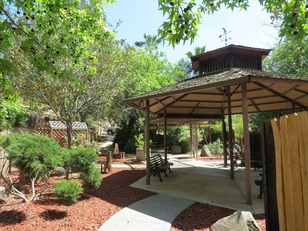 Patio area with table at RANCHO LOS COCHES RV PARK