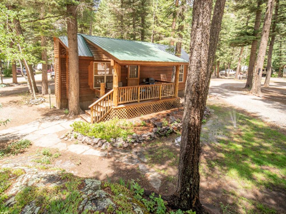 A little cabin with a porch