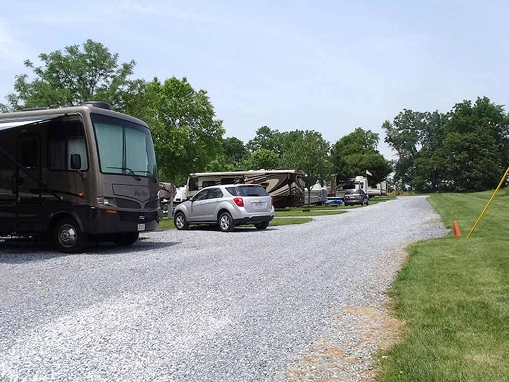 RVs and trailers at campground at COUNTRY ACRES CAMPGROUND