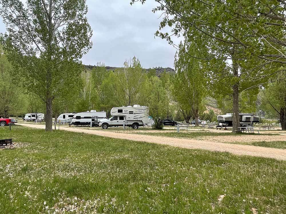 A grassy area next to the campsites at BRYCE-ZION CAMPGROUND