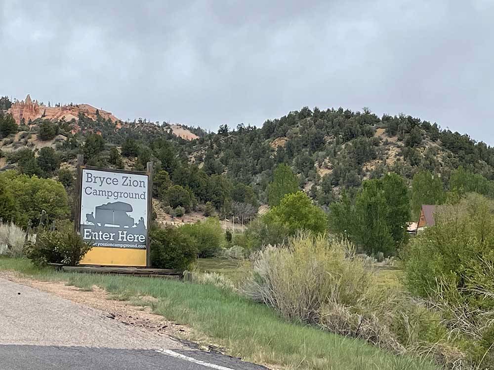 The enter here front sign at BRYCE-ZION CAMPGROUND