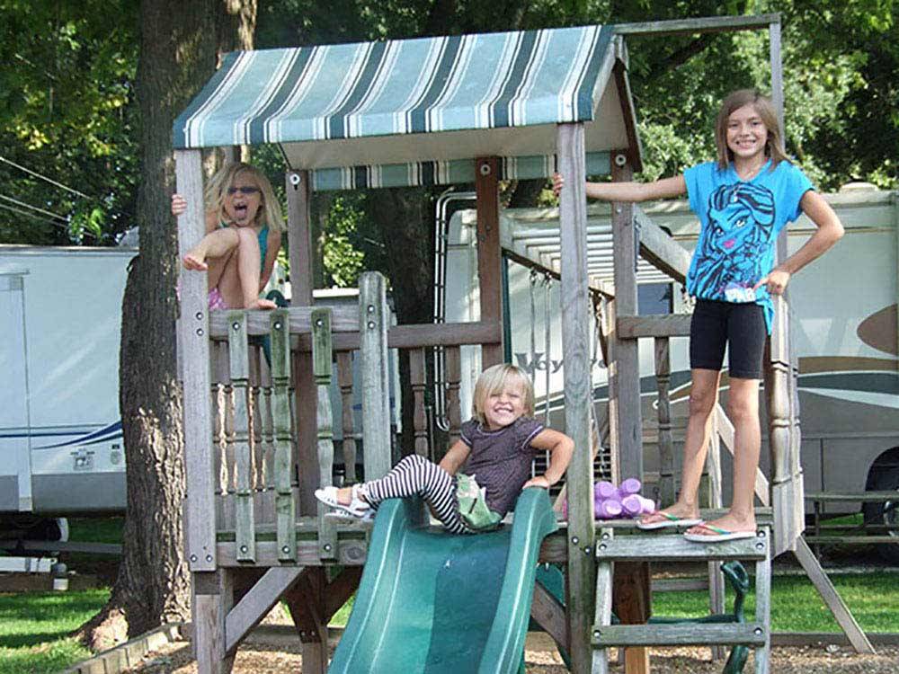 Kids playing at FLORY'S COTTAGES & CAMPING