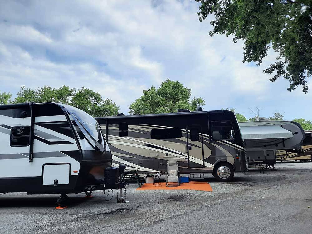 Multiple RVs parked on-site at LOUISVILLE NORTH CAMPGROUND