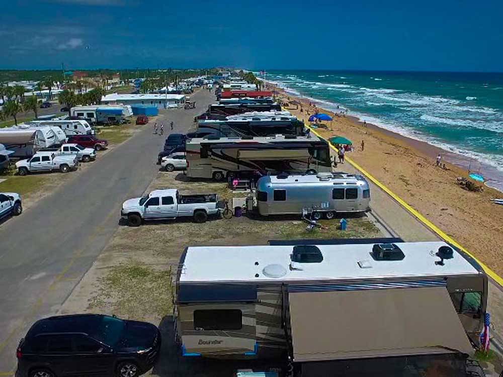 Trailers at grounds beside the shore and ocean at BEVERLY BEACH CAMPTOWN RV RESORT