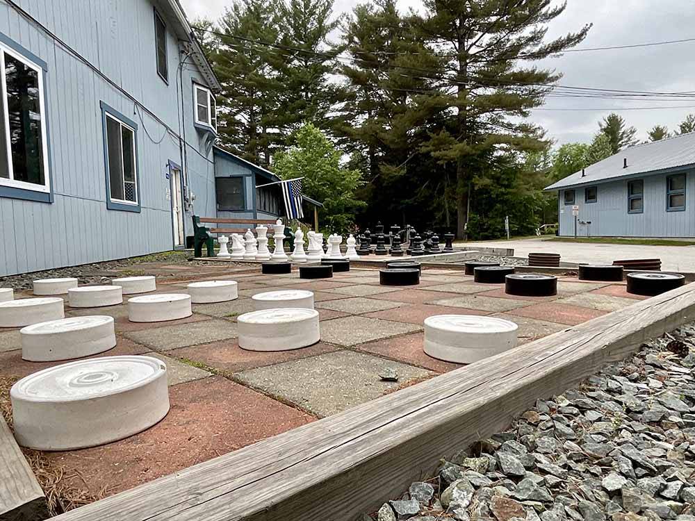 A gigantic checker and chess set at BEECH HILL CAMPGROUND & CABINS