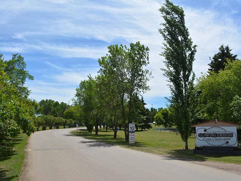 Road leading into campground at GLOWING EMBERS RV PARK & TRAVEL CENTRE