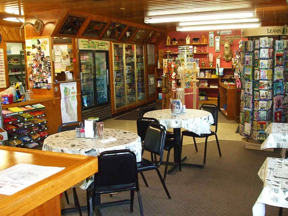 Interior of gift shop with dining tables at BROWN'S TOWN CAMPGROUND