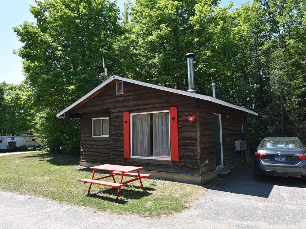 Cabin 101 and a picnic table at GLENVIEW COTTAGES & RV PARK