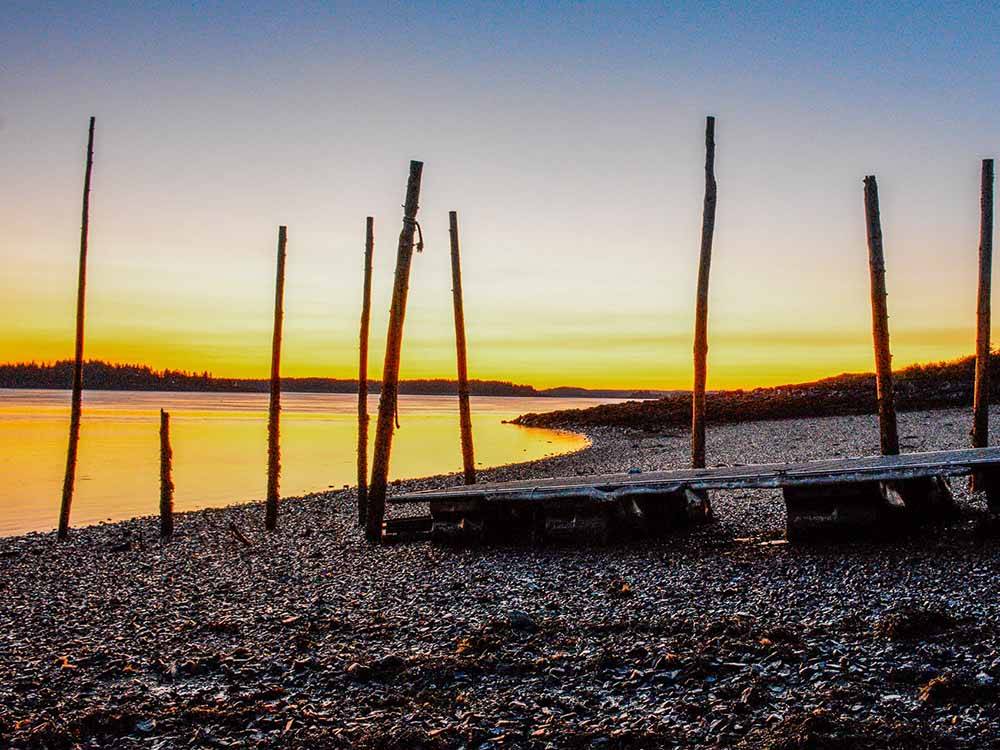 A ramp and large sticks on the beach at SEAVIEW CAMPGROUND & COTTAGES