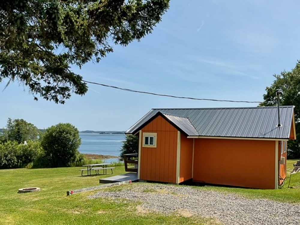 One of the rental cabins overlooking the water at SEAVIEW CAMPGROUND & COTTAGES